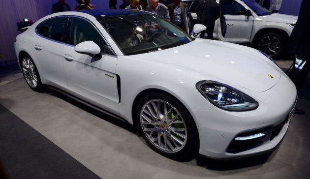 A Porsche Panamera 4 e-hybrid  is presented during  the Volkswagen Group Night in Paris on September 28, 2016 a day prior to the opening to the press of the Paris motor Show. / AFP / ERIC PIERMONT        (Photo credit should read ERIC PIERMONT/AFP/Getty Images)