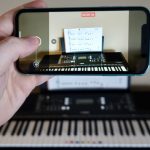 QuickTake su iPhone 11 consente (per ora) di acquisire video senza mettere in pausa la musica